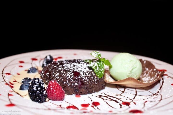 Warm chocolate dessert with berries